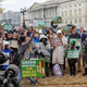 Duverge chants on Capitol Hill as Rep. Ocasio-Cortez and Sen. Bernie Sanders introduce the Green New Deal for Public Housing.